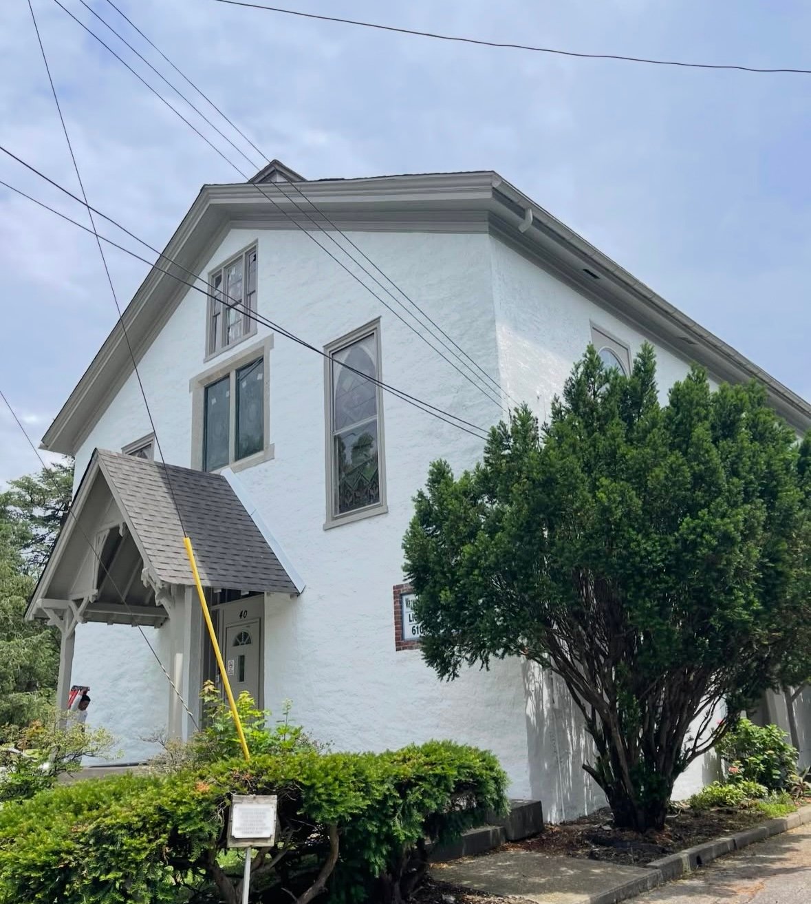 Commercial building after full exterior repaint and restoration by Fox and Fern